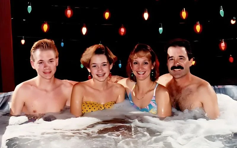 image of some ladies and men bathing