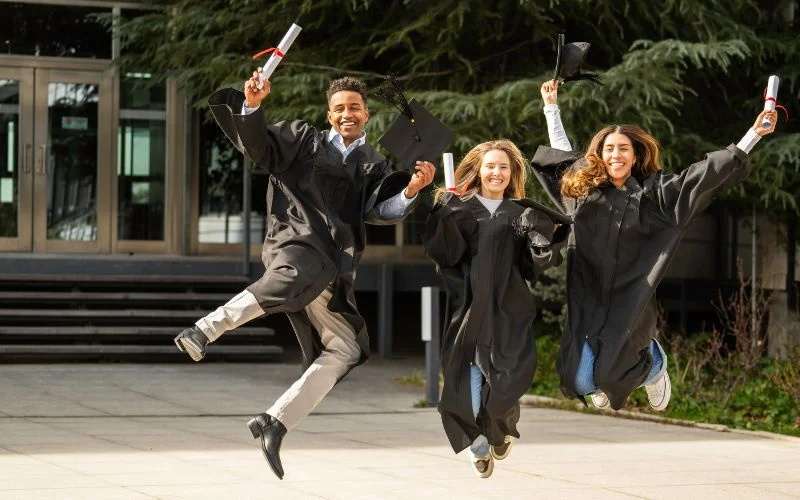 graduation photo poses while jumping
