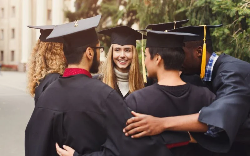 Group grad hug pose