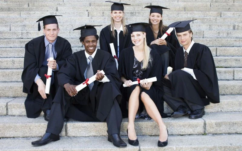 Sitting graduation pose