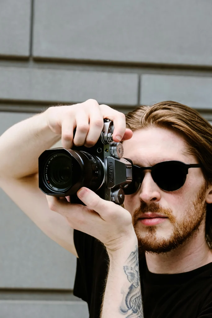photo of a man with a camera