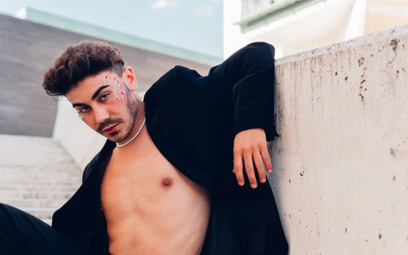 dashing dude hand poses for pictures