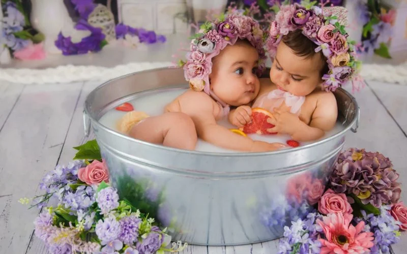 aesthetic photo of siblings in a small tub