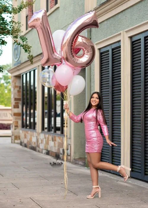 carry out street photography for elegant shots, Sweet 16 playful pose, Sweet 16 joyful pose