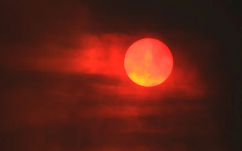 capturing sunset with long lens, sunset photography with telephoto lens, best settings for sunset with long lens