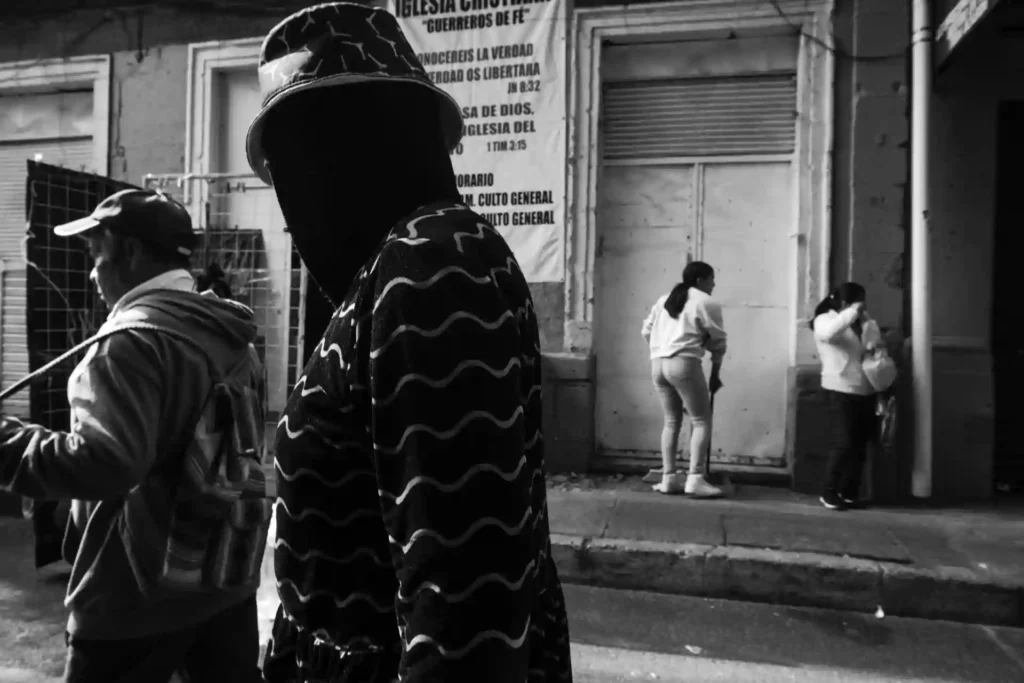 High contrast black and white photography showing bold street scene