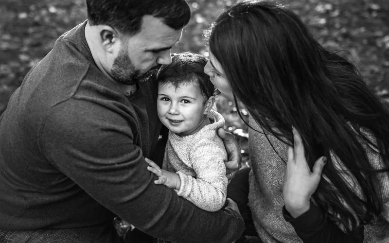 black and white family portrait by ally quinlan
