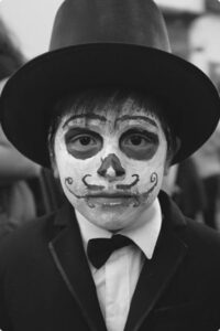 Man In black and white with face painting