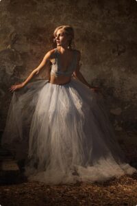 Portrait Image of women wearing white gown