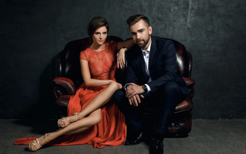 seated together power couple pose