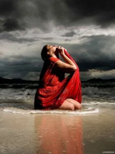 Model posing for a portrait photoshoot with guided hand and body positioning